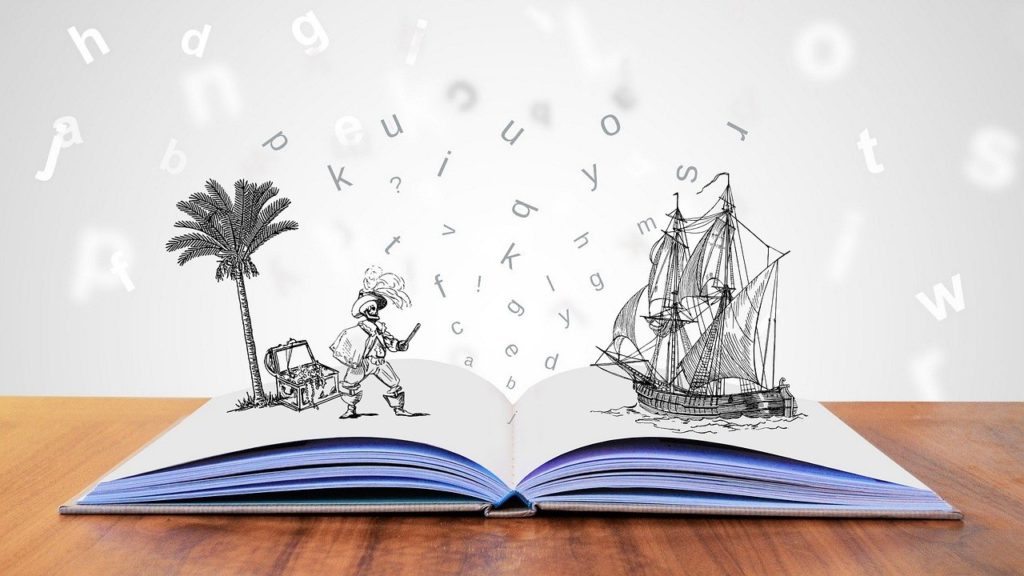 Livre ouvert avec des pages blanches. Deux dessins émergent des pages. Sur la gauche, un pirate avec une boîte au trésor et un palmier. A droite, un vaisseau. Les lettres flottent au-dessus du livre.